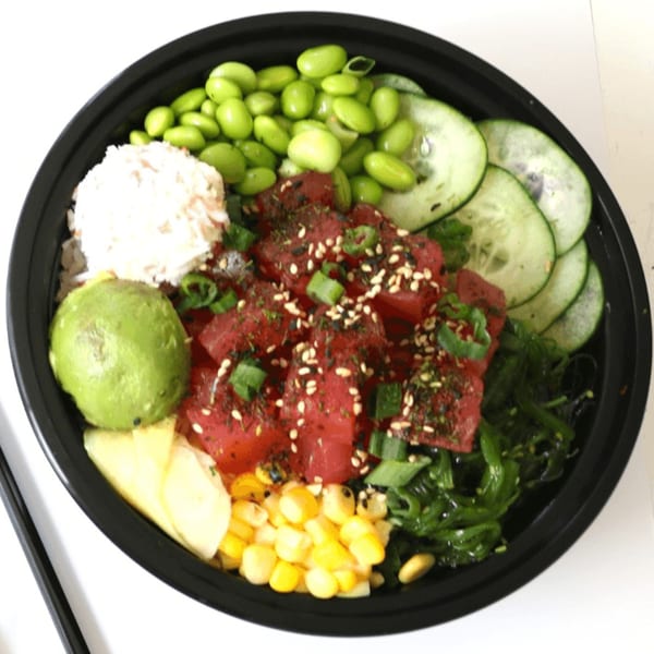 A Grindz poke bowl with tuna, edamame, cucumber, avocado, corn, and seaweed salad.